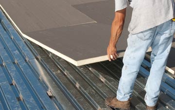 benefits of insulating Alminstone Cross flat roofing